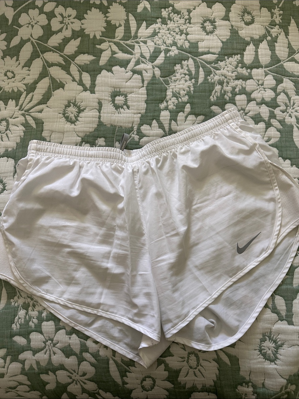 Nike Women's White Athletic Running Shorts with Silver Swoosh